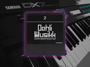 DXtraterrestrial 2 cartrigde with a Yamaha DX7 synthesizer in the background